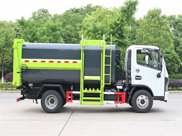 東風(fēng)7方側裝掛桶壓縮垃圾車(chē)